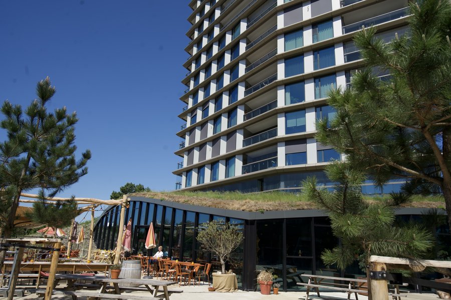 Rooftop terrace with hospitality venue on a TwinPire residential tower
