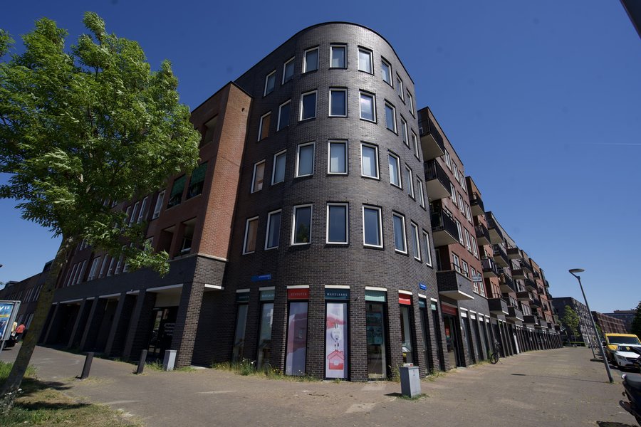 Commercial corner building with shops and offices from the TwinPire portfolio